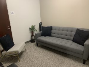 sherman oaks suite 1208, room 1, large grey sofa