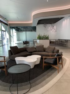 Glendale office lobby, large brown sofa, white table