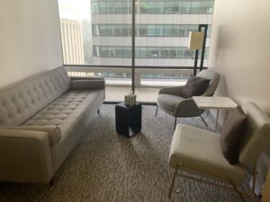 sherman oaks suite 1208, room 5, large tan sofa, two chairs