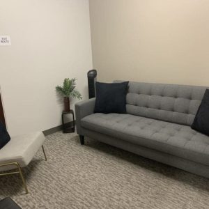 sherman oaks suite 1208, room 1, large grey sofa